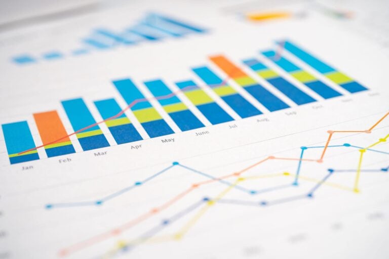 Business growth and market trend graph with colorful data lines.
